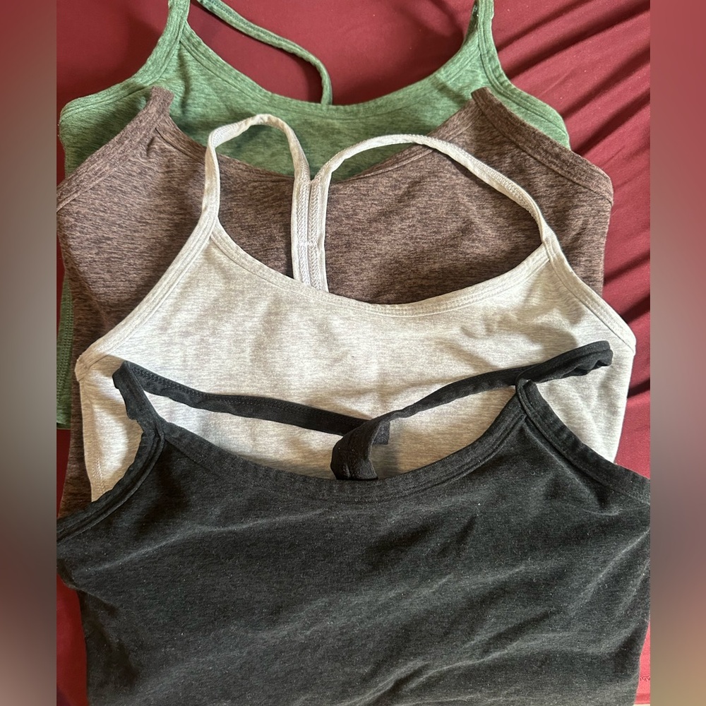 Beyond Yoga: Set of Four Tank Tops in Green, Brown, Gray, and Black
